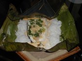 Swordfish in banana leaf with ginger, coriander, chilli and coconut milk 